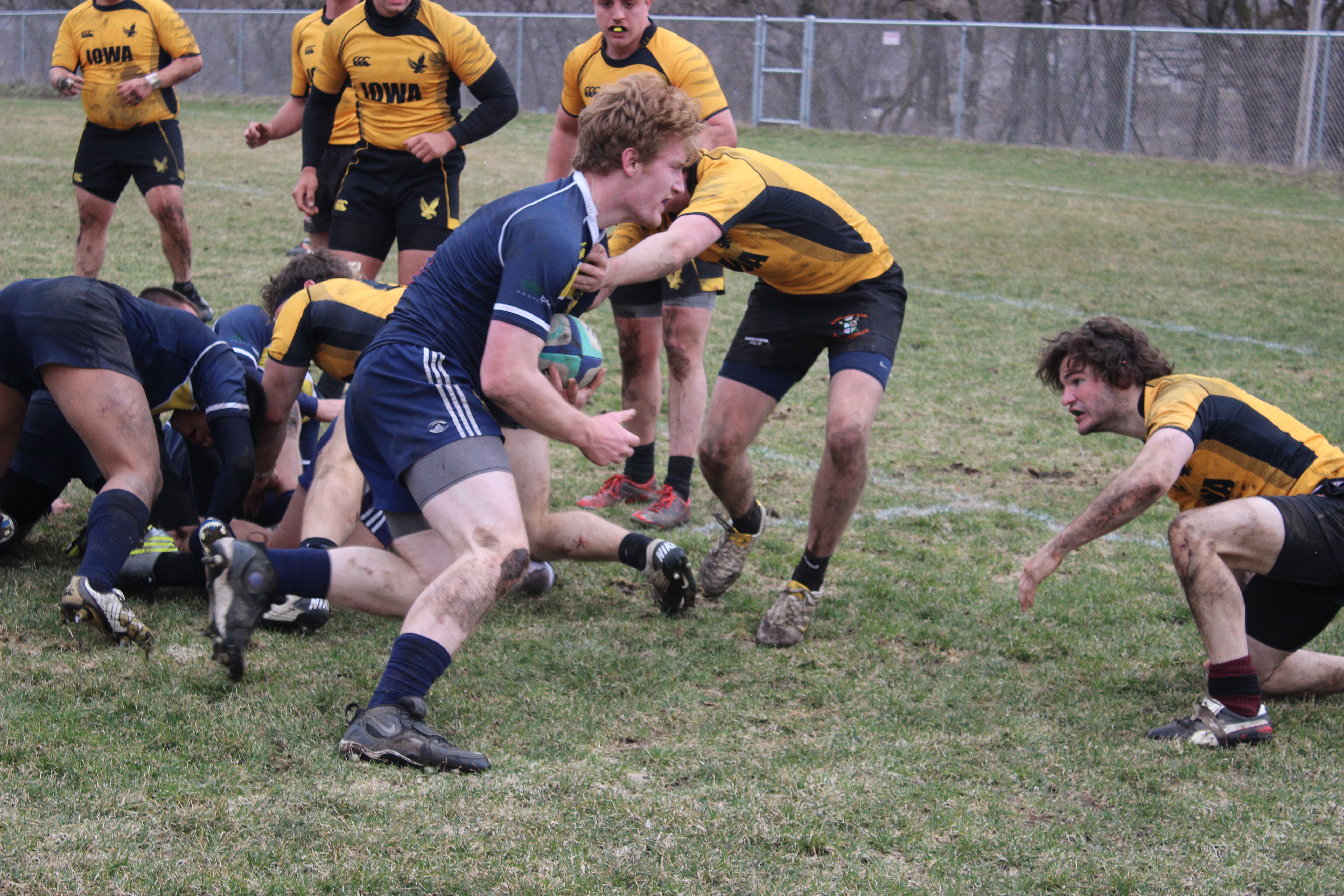 Stuart Starkweather runs with the ball near the try line.