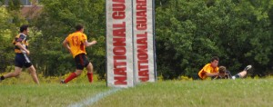 Cooper Smart scores for Michigan with Kevin Linder looking on