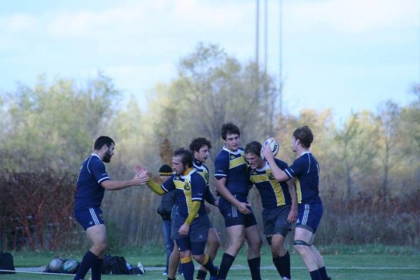 Michigan celebrates a Cole Van Harn score