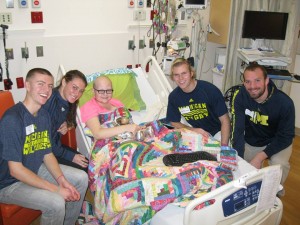Ryan McDonough along with other athletes at Mott's