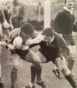 Chapman preparing to tackle the scrumhalf for the University of Victoria, British Colombia, in the 1986 North American Rugby Championship Finals in Victoria, British Colombia.
