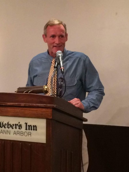 Jeff Hagan makes a speech after being inducted into UMRFC's Hall of Inspiration